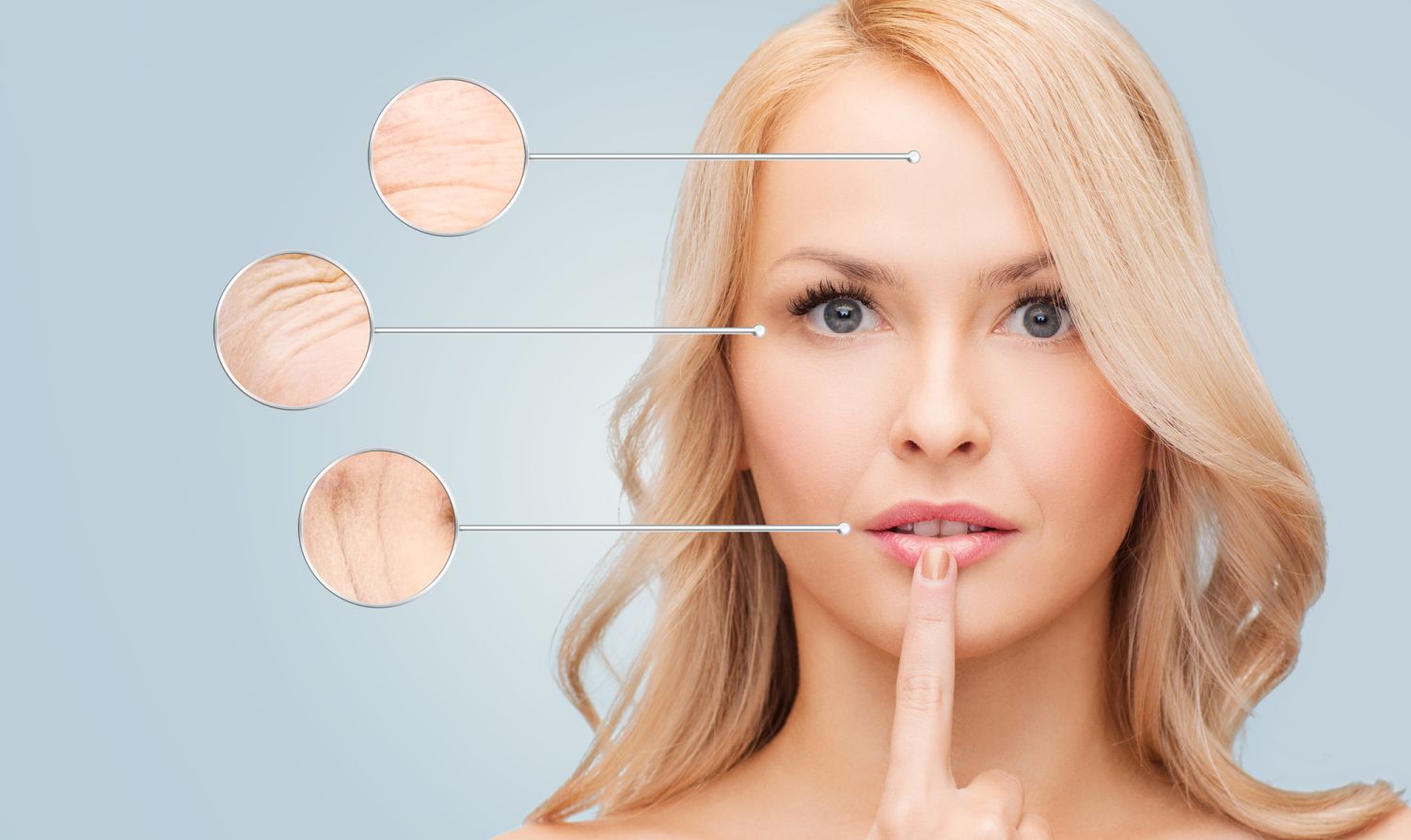 health, people and beauty concept - beautiful young woman touching her lips over blue background